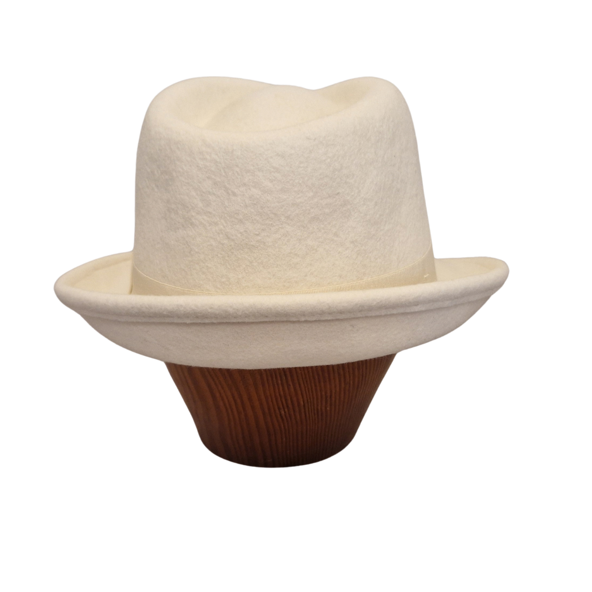 A cream felt trilby hat with a matching band and bow, displayed on a brown wooden mannequin head against a white background. Back
