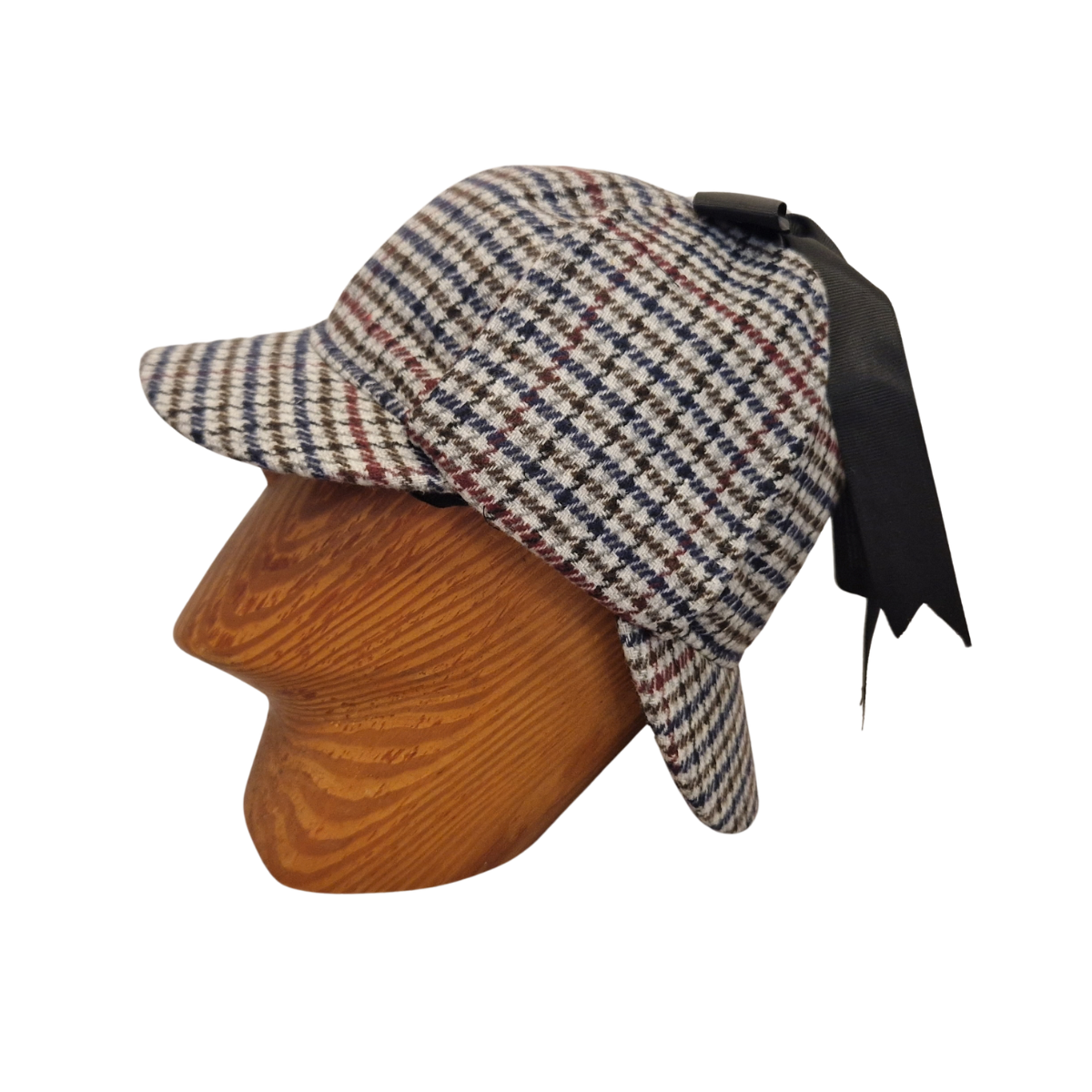 A classic deerstalker hat with a grey,  brown, black, and white houndstooth pattern, displayed on a wooden mannequin head against a plain white background. Side