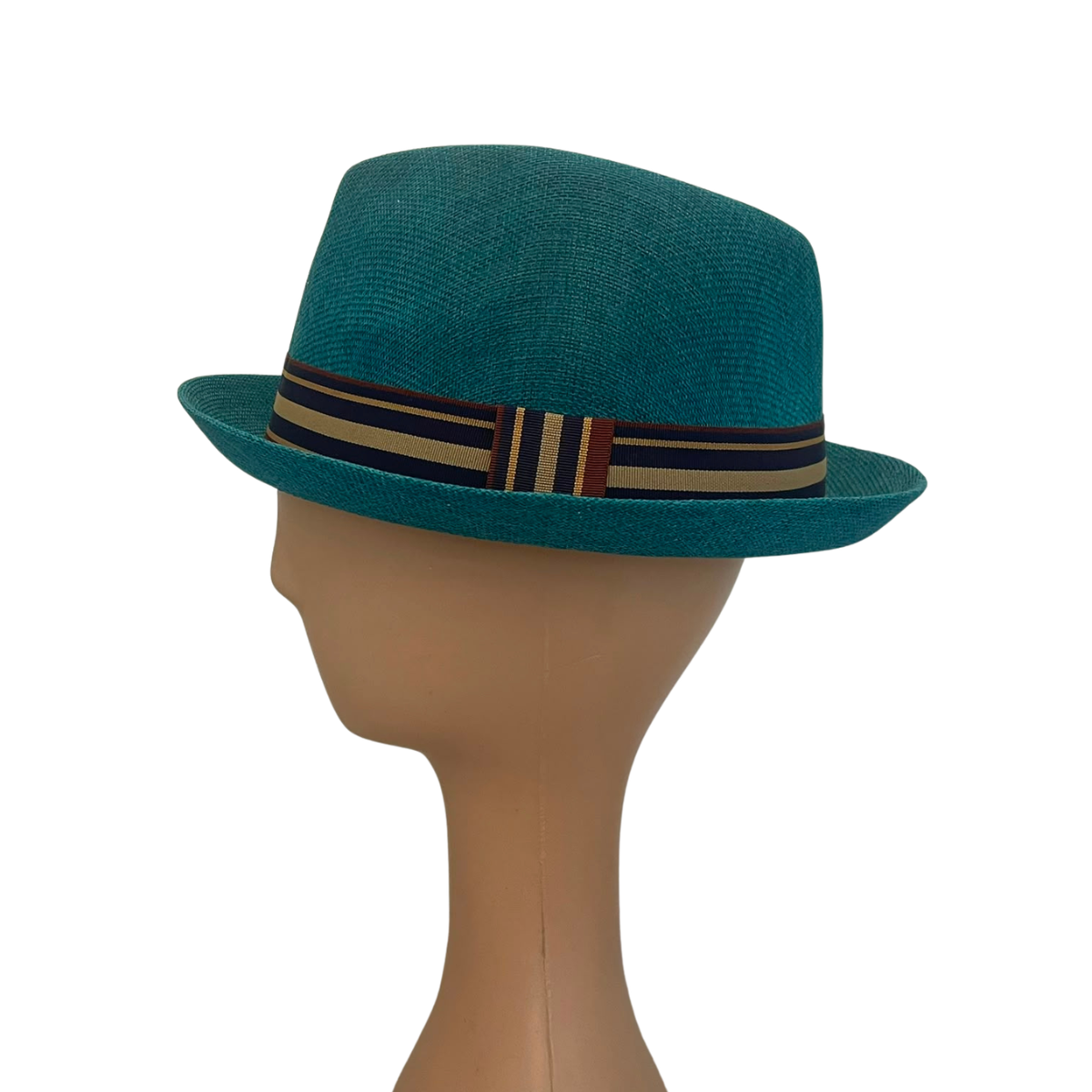A teal blue woven fedora hat with a striped band in navy, beige, and red, displayed on a tan mannequin head against a white background.