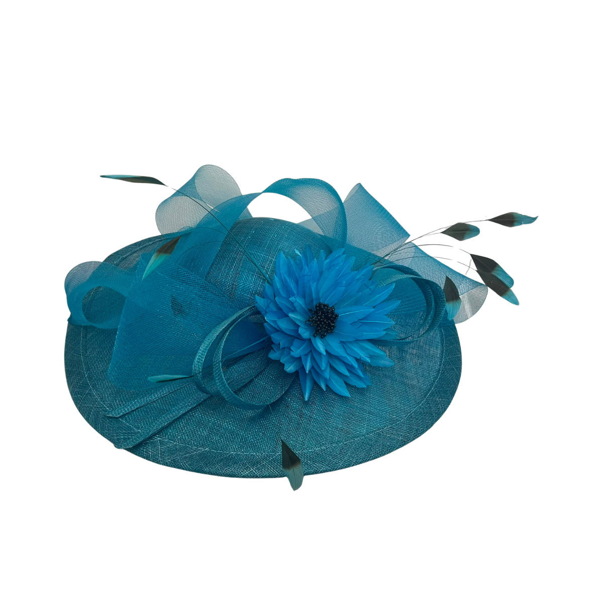 A teal blue fascinator hat featuring a woven brim, a large blue artificial flower, sheer mesh ribbon loops, and feather accents, shown against a plain white background.