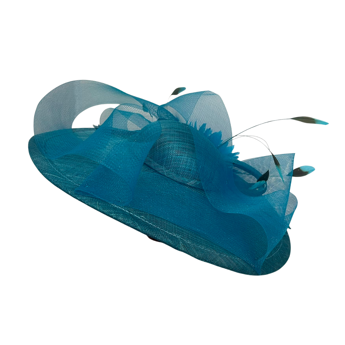 A teal blue fascinator hat made of sheer mesh and structured fabric, featuring decorative feather-like accents and long thin feathers with blue tips, shown on a plain white background.